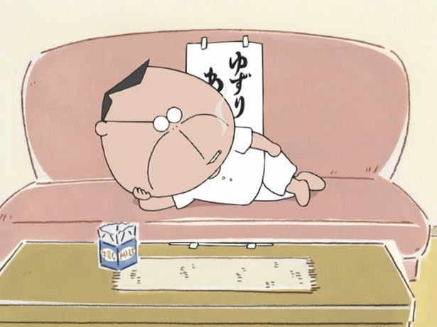 ソファーでくつろぐ父