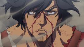 闘志をみなぎらせる表情のアウス