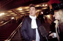 英国が誇るポップスター、ロビー・ウィリアムスの活躍に迫る