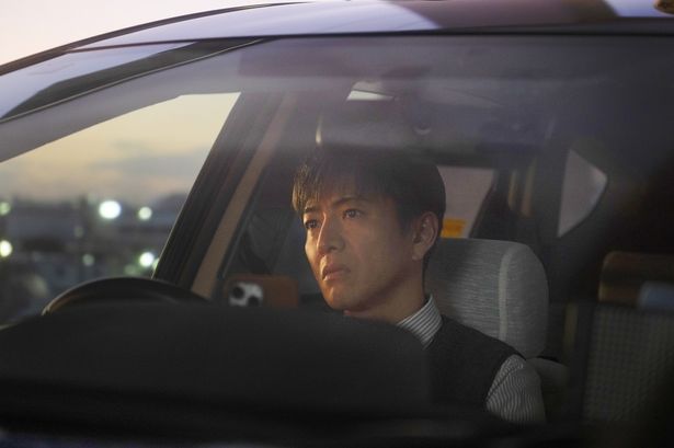 木村拓哉演じる鬱々とした日々を送るタクシー運転手、宇佐美浩二