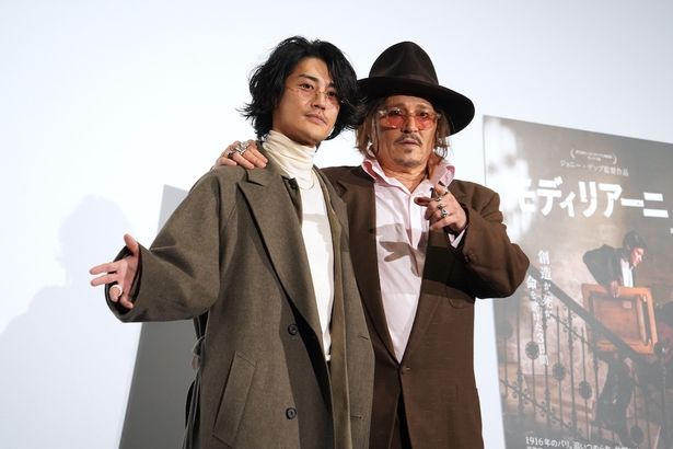 笑顔でフォトセッションに応じていた