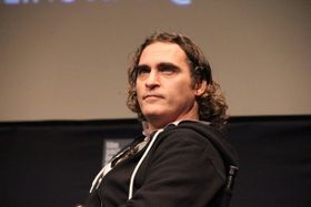 ジェームズ・グレイ監督作『The Immigant』に主演し、ニューヨーク映画祭の会場に姿を現したホアキン・フェニックス