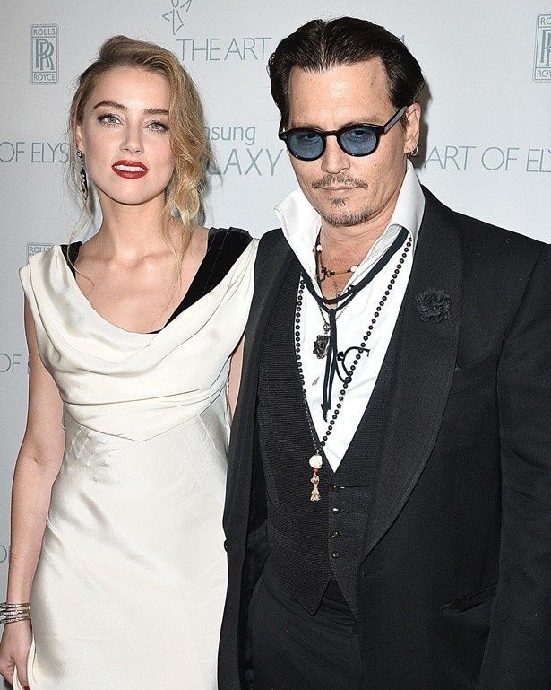 【写真を見る】先日、公の場に姿を現し離婚説を一蹴したジョニデとアンバー・ハード